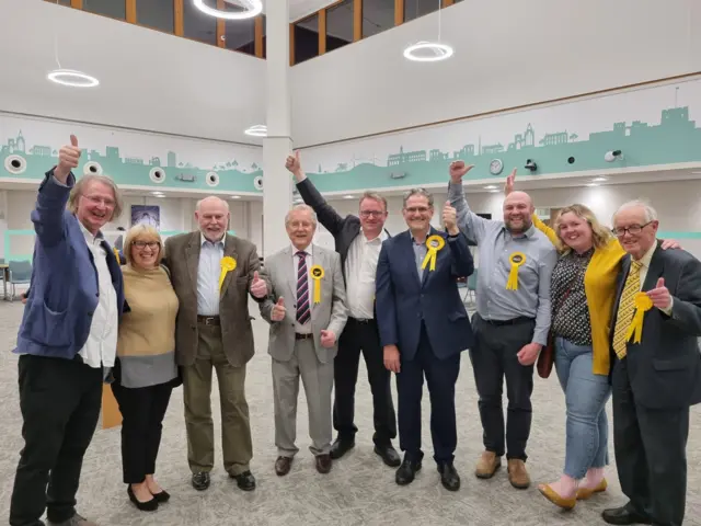 Lib Dem candidates celebrating