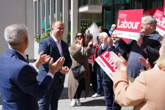 Adam Hugg greets Sadiq Khan