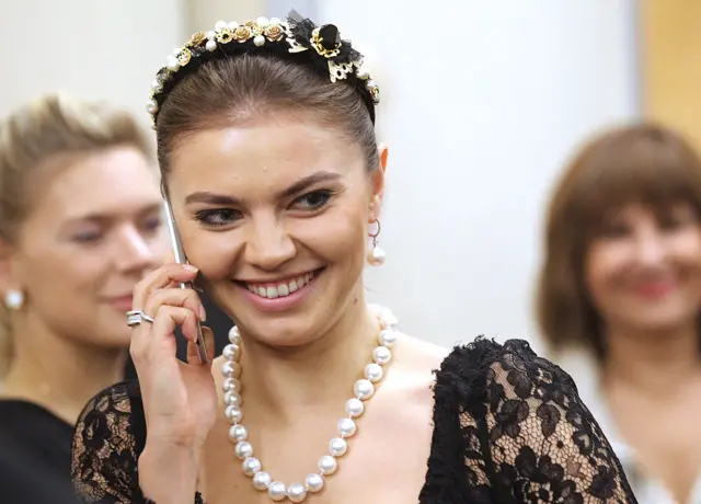 Russian retired gymnast and politican Alina Kabaeva attends a reception in February 8, 2014 in Sochi, Russia