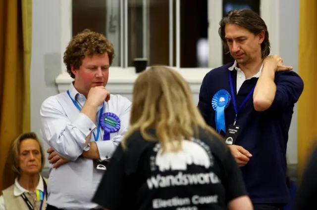 Conservative Party supporters react to the counting process during local elections, at Wandsworth Town Hall, London, Britain May 6, 2022.