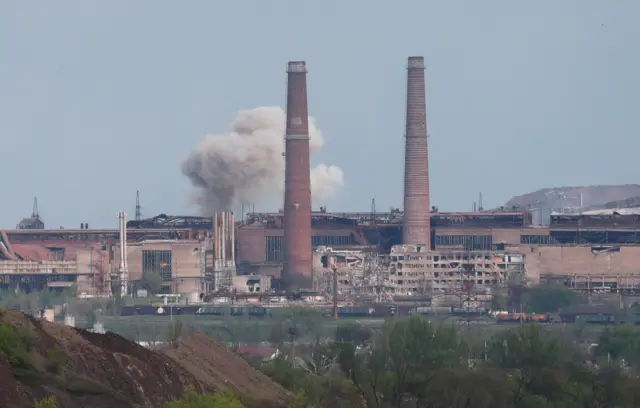 Smoke rises about the Azovstal steel plant in Mariupol