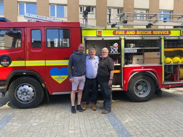 Daniel, Simon and Richard pictured in front of the truck