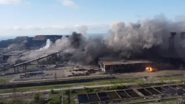 An aerial view shows shelling at the Azovstal steel plant complex