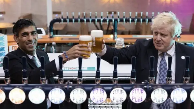 Rishi Sunak and Boris Johnson on a visit to a brewery last year