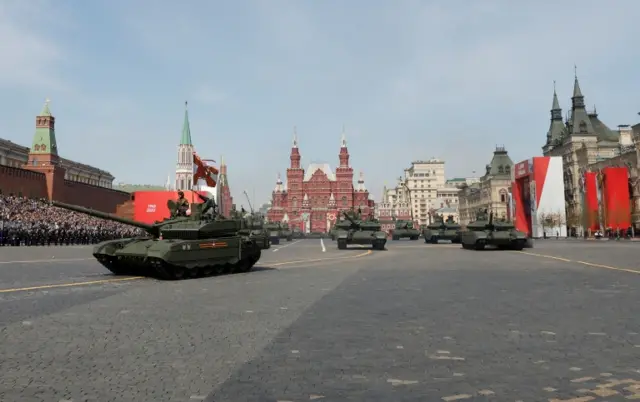 Russian armoured vehicles, including T-90M tanks, drive in Red Square during a rehearsal for a military parade marking the anniversary of the victory over Nazi Germany in World War Two in central Moscow, Russia May 7, 2022