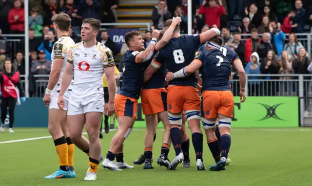 Edinburgh celebrate Magnus Bradbury's try