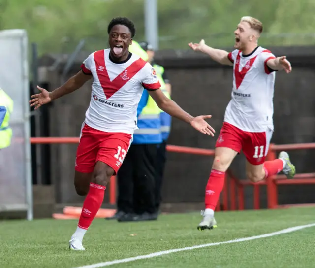 Jonathan Afolabi celebrates his extra-time goal