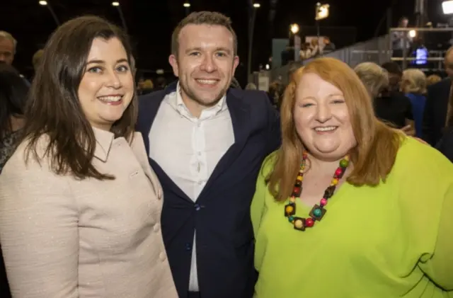 First time winner Peter McReynolds is pictured with his wife and the leader of the Alliance Party, Naomi Long