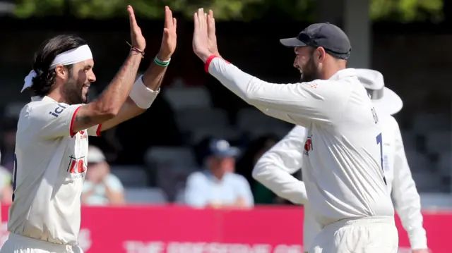 Essex celebrate a wicket against Yorkshire.