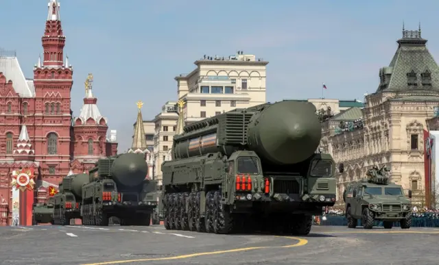 Russian military vehicles, including Yars intercontinental ballistic missile systems, drive in Red Square during a rehearsal for a military parade marking the anniversary of the victory over Nazi Germany in World War Two in central Moscow, Russia May 7, 2022