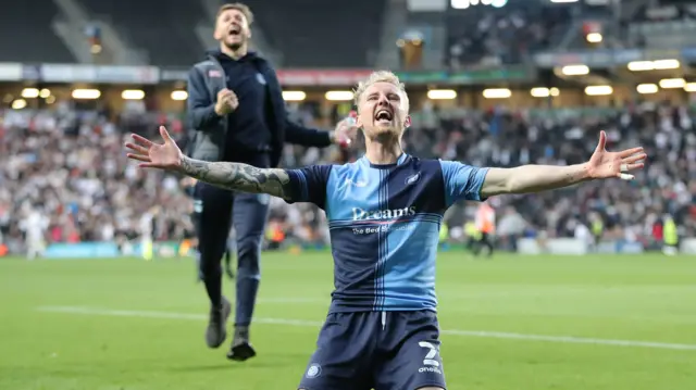 Jack Grimmer of Wycombe Wanderers celebrates after the match