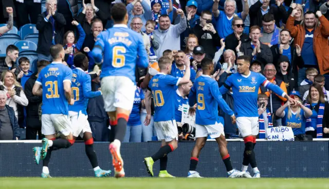 Rangers celebrate James Tavernier's opening penalty