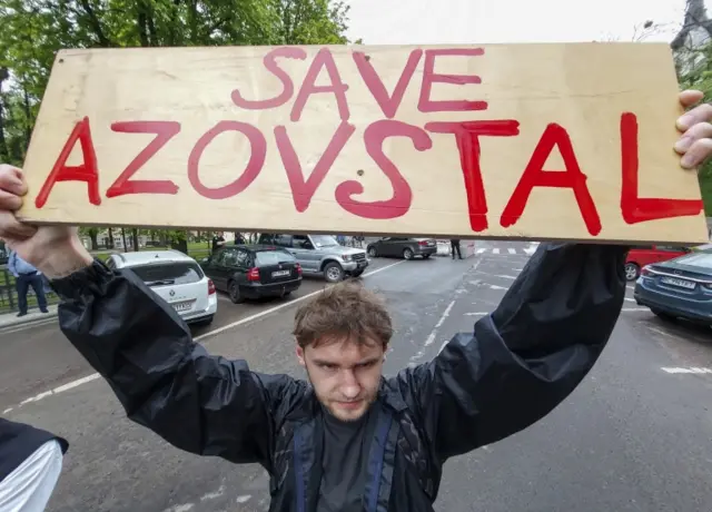 A man participates in #SaveMariupol rally in Lviv, Ukraine, on 6 May