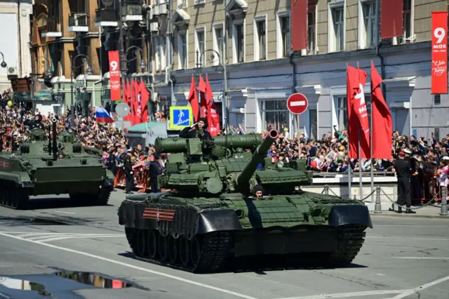 Military vehicles roll through the far eastern city of Vladivostok