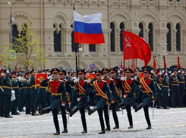 Russian service members take part in a military parade on Victory Day, which marks the 77th anniversary of the victory over Nazi Germany in World War Two, in Red Square in central Moscow, Russia May 9