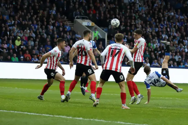 George Byers tries an overhead kick