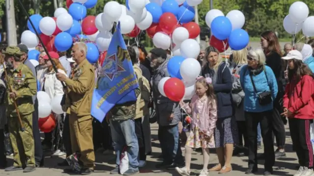 People attend Victory Day ceremony in Mariupol