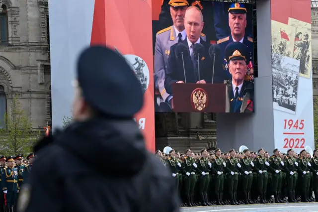 Putin seen on screen at Victory Parade