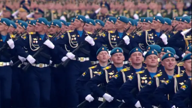 Russian soldiers parade through Red Square in Moscow