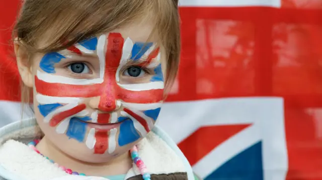 Child with Union flag facepaint