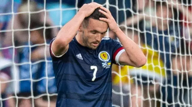 John McGinn missed a glorious chance with the game at 2-0