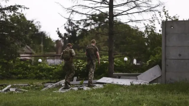 Ukrainian servicemen patrol the territory close to a front line near the small city of Bakhmut in Ukraine's Donetsk region