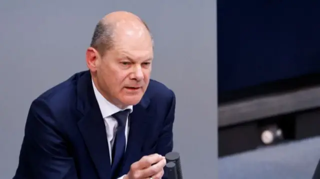 German Chancellor Olaf Scholz speaks during a session of Germany's lower house of parliament, the Bundestag, in Berlin