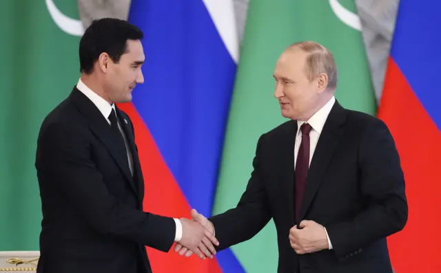 Russian President Vladimir Putin (R) and Turkmenistan"s President Serdar Berdymukhamedov during a joint press conference following their meeting in Moscow, Russia, 10 June 2022.