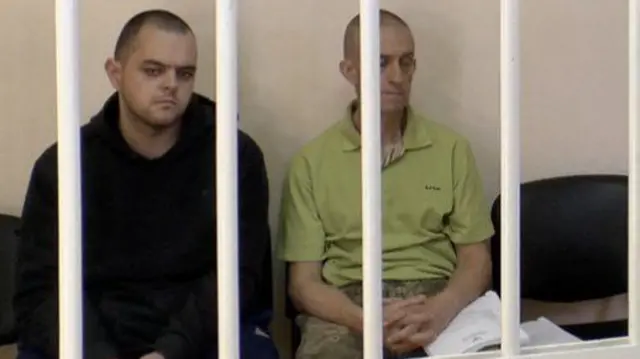 Aiden Aslin and Shaun Pinner sitting behind bars in court