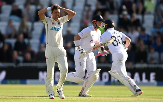 rent Boult of New Zealand reacts after Daryl Mitchell drops Ollie Pope of England during day two of Second LV= Insurance Test Match between England and New Zealand at Trent Bridge