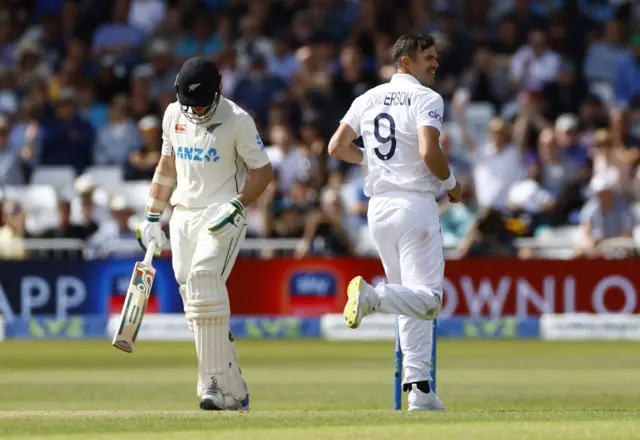 England's James Anderson celebrates after taking the wicket of New Zealand's Michael Bracewell