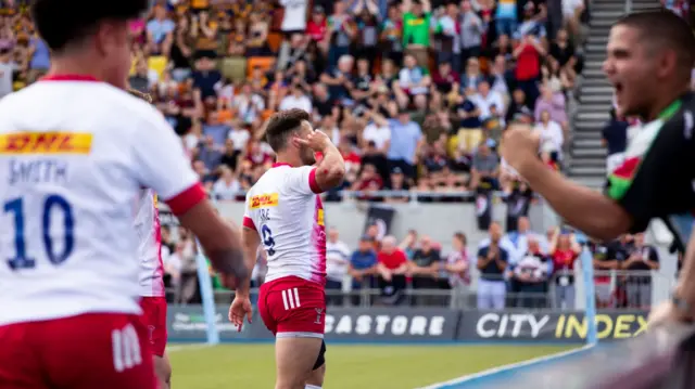 Danny Care celebrates his try