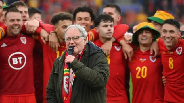 Dafydd Iwan sings Yma o Hyd after the FIFA World Cup Qualifier between Wales and Ukraine at Cardiff City Stadium on 5 June, 2022 in Cardiff, Wales