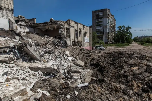 A building destroyed by a military strike in Lysychansk