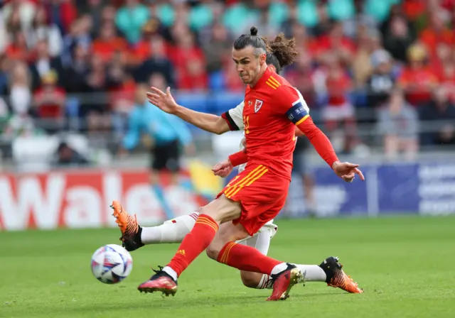 Gareth Bale puts a shot just wide from Dan James' cross