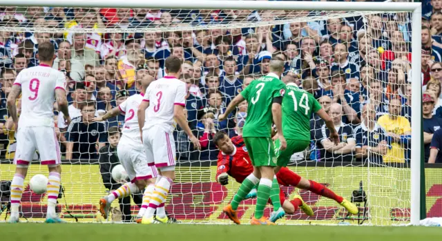 Jonathan Walters scores for Ireland in a 1-1 draw with Scotland in June 2015