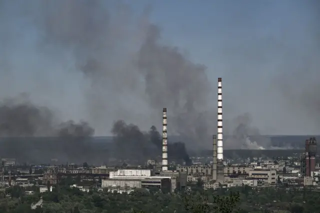 Smoke rises after a military strike on a compound of the Sievierodonetsk's Azot Chemical Plant