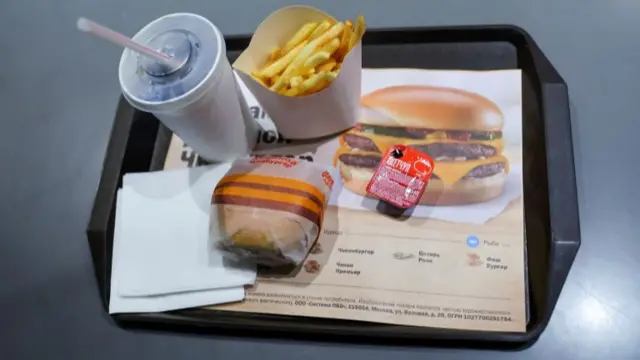 A view shows a tray with food and a drink at the new restaurant "Vkusno i tochka", which opens following McDonald's Corp company's exit from the Russian market,