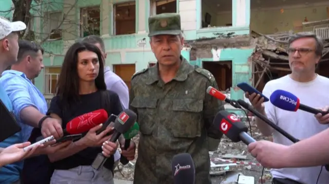 Donetsk People's Republic representative Eduard Basurin speaking to the media