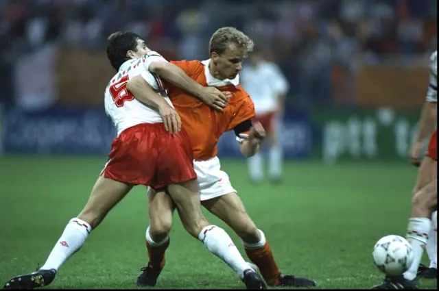 Denis Bergkamp and Andy Melville