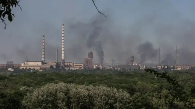 Smoke rises after a military strike on a compound of the Severodonetsk's Azot Chemical Plant amid Russia's attack on Ukraine continues