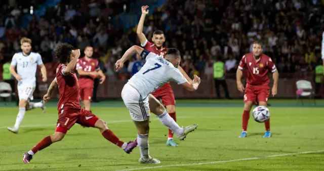 John McGinn's finish on the turn added Scotland's third