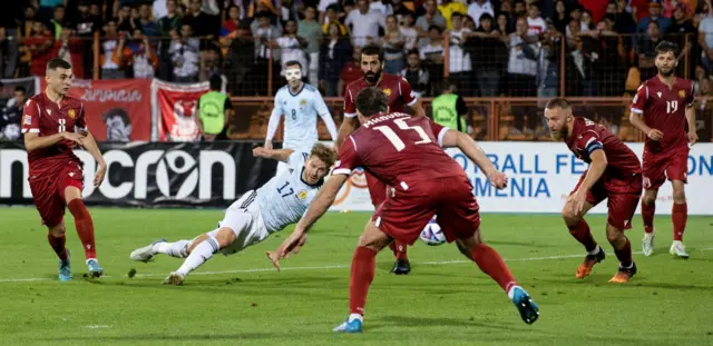 Armstrong bags his and Scotland's second in first-half injury time after showing great feet in the box
