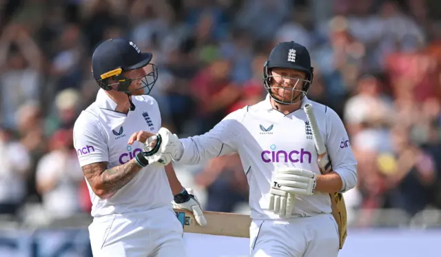 Jonny Bairstow and Ben Stokes fist bumping while batting together