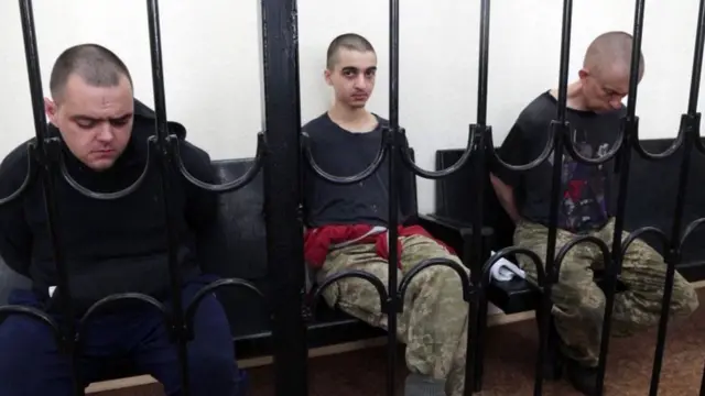 Aiden Aslin (left), Shaun Pinner (right), and Moroccan national Saaudun Brahim (centre) were sentenced to death