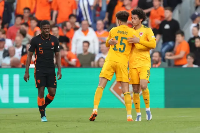 Brennan Johnson (right) celebrates with Ethan Ampadu