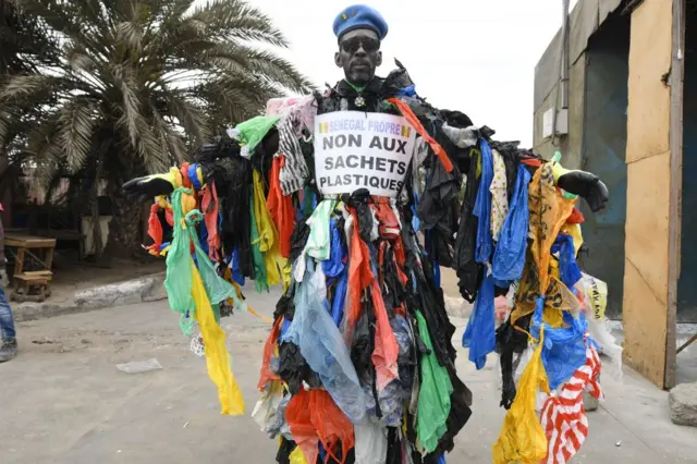 Man with plastic all over his body