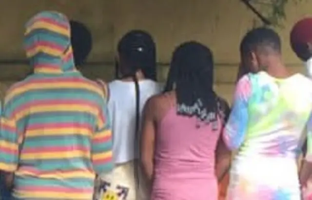 The backs of rescued women