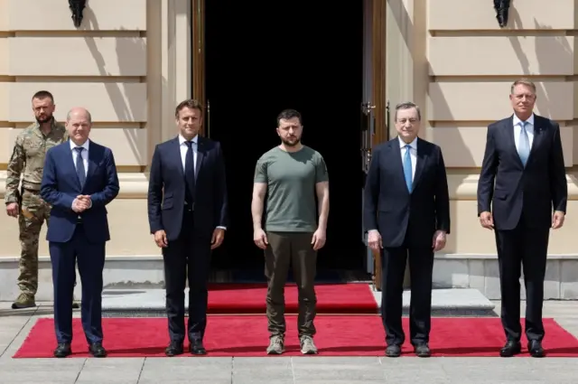 (Left to right) German Chancellor Olaf Scholz, French President Emmanuel Macron, Ukrainian President Volodymyr Zelensky, Italian Prime Minister Mario Draghi and Romanian President Klaus Iohannis stand for a photograph, outside the Mariyinsky Palace