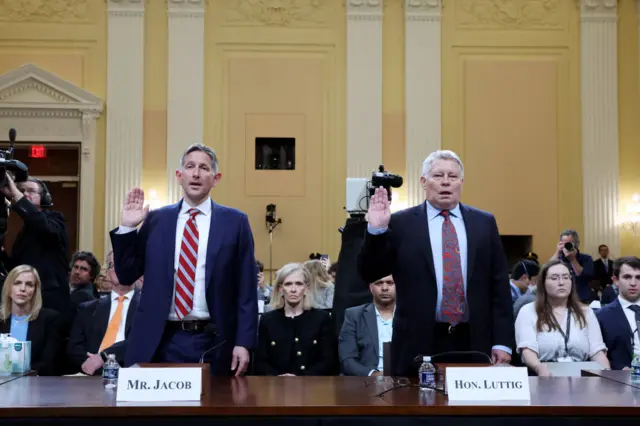 Greg Jacobs and Michael Luttig are sworn in to testify before the 6 January committee on Thursday